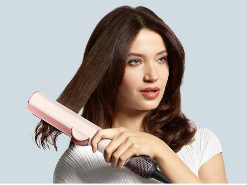 23867 2 Pegla za kosu Airstrait sa integrisanim cesljem DYSON Plum Copper 650104